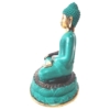 Figur Buddha im Lotussitz auf Lotusblüte